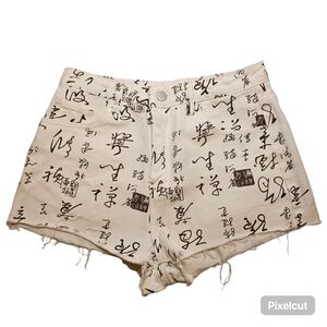 SHEIN white and brown writings cotton blend jean shorts in size S US